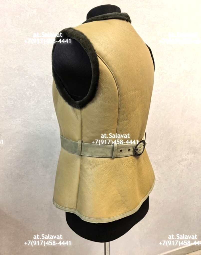 Черный женский жилет из дубленой овчины Черный женский жилет из дубленой овчины