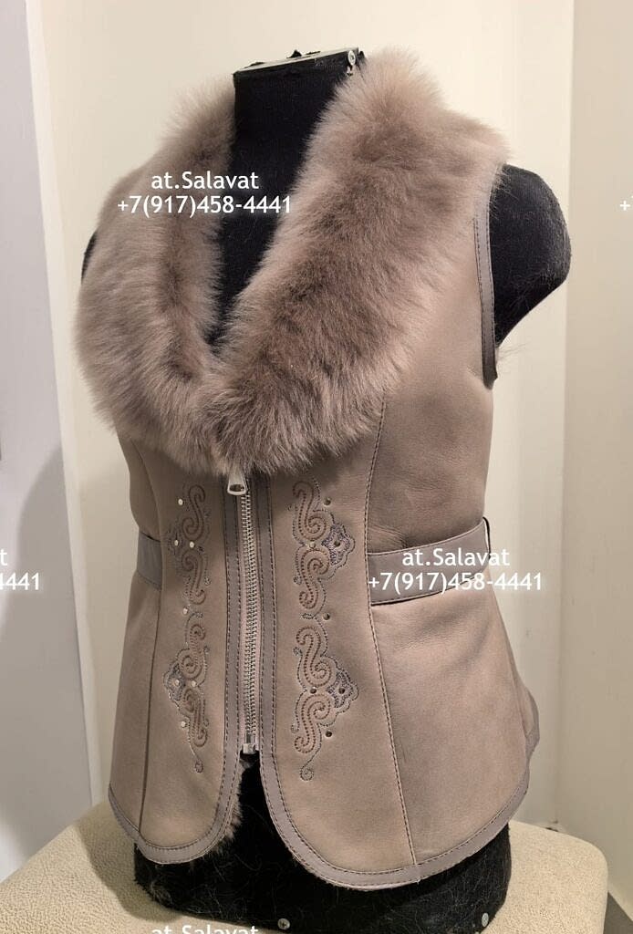 Черный женский жилет из дубленой овчины Черный женский жилет из дубленой овчины