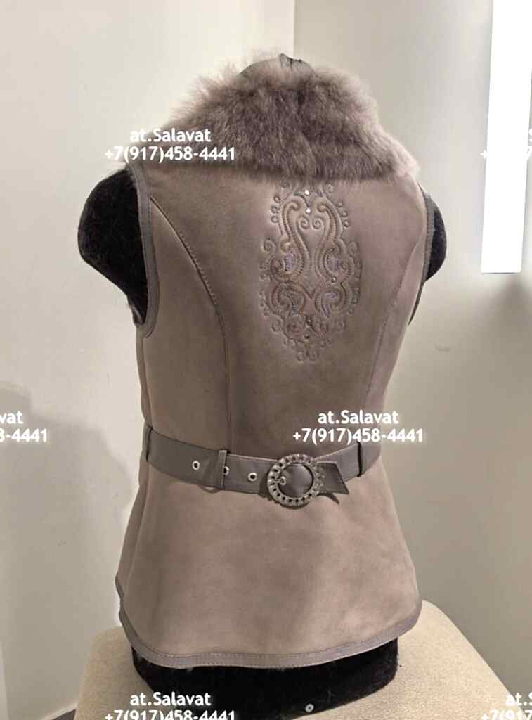 Черный женский жилет из дубленой овчины Черный женский жилет из дубленой овчины